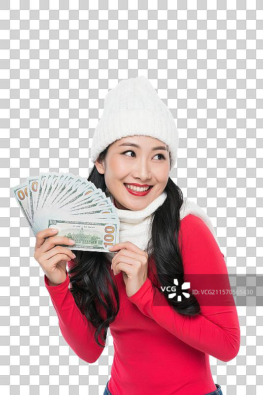 年轻女子拿着钞票图片素材