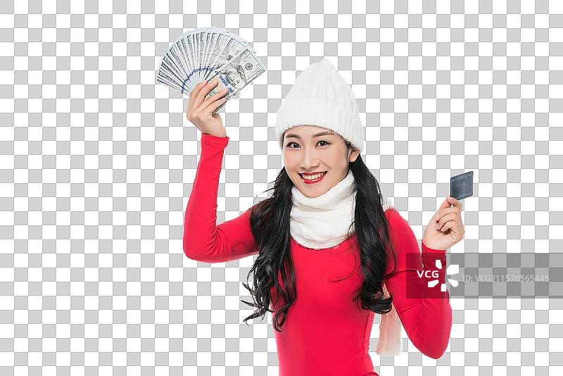 年轻女子拿着钞票图片素材