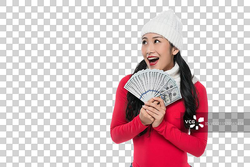 年轻女子拿着钞票图片素材