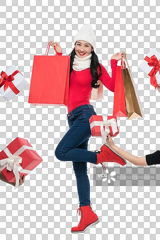 年轻女子拿着购物袋图片素材