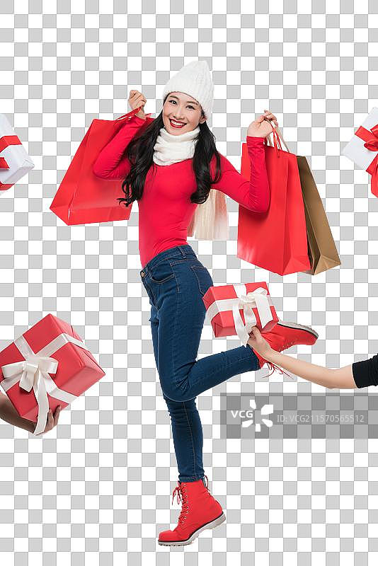 年轻女子拿着购物袋图片素材