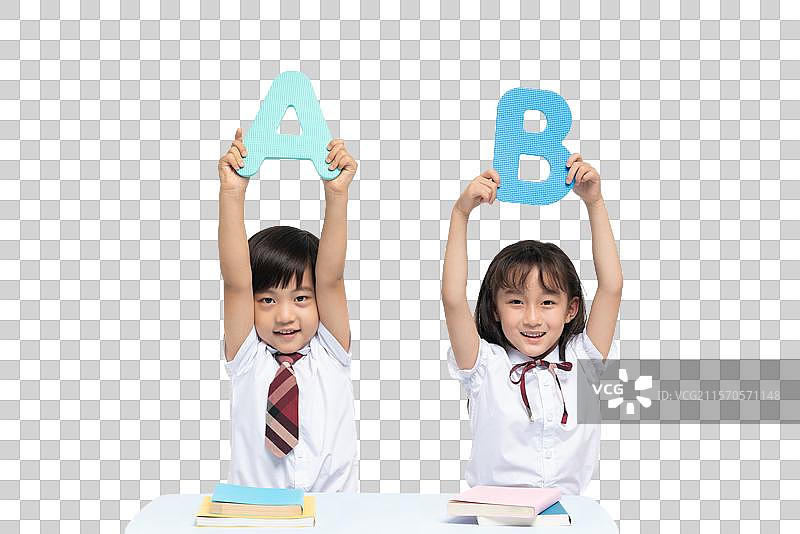 小男孩和小女孩在学习图片素材