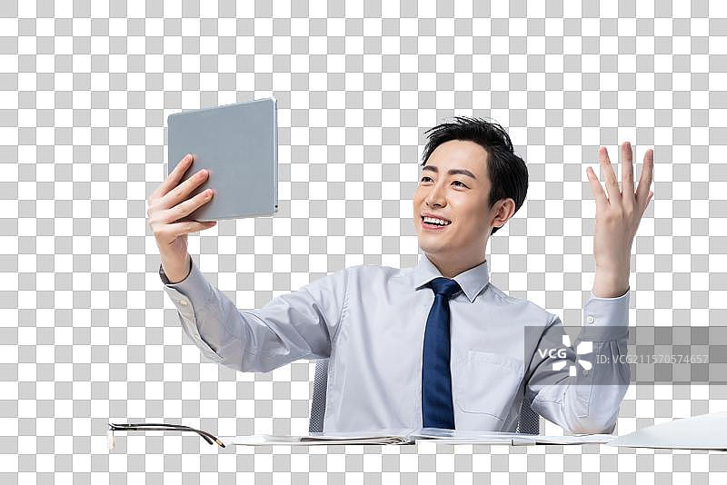 年轻商务男士使用平板电脑图片素材