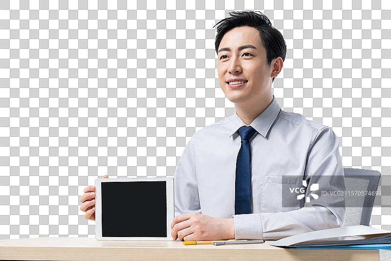 年轻商务男士使用平板电脑图片素材