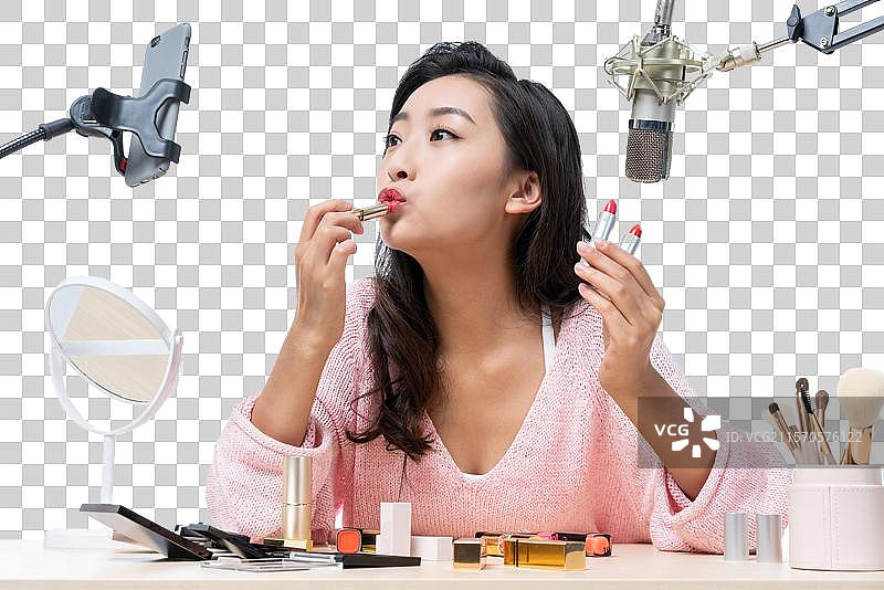 年轻女子直播图片素材