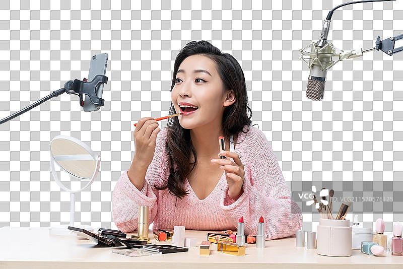 年轻女子直播图片素材