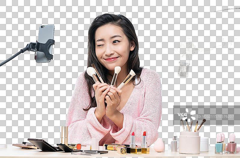 年轻女子直播图片素材