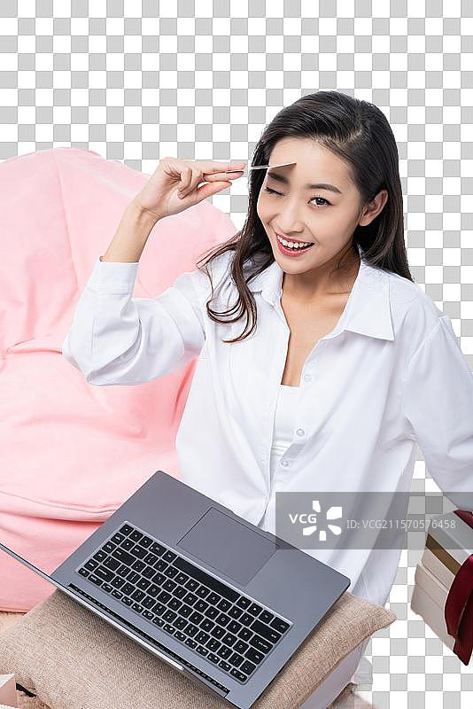 年轻女子网上购物图片素材