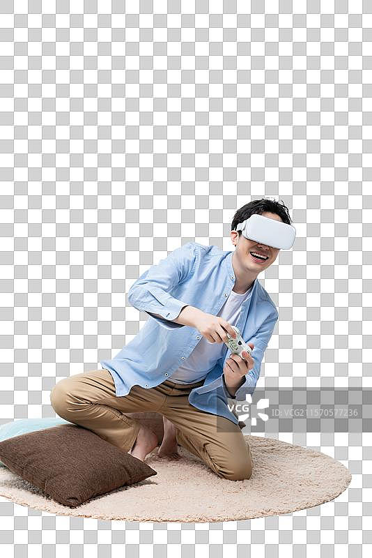 年轻男子在玩VR游戏图片素材