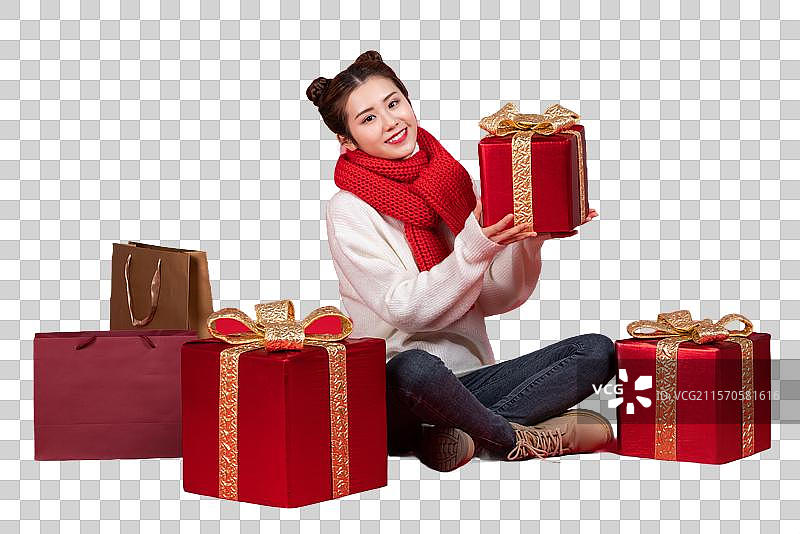 快乐的年轻女子和礼物图片素材
