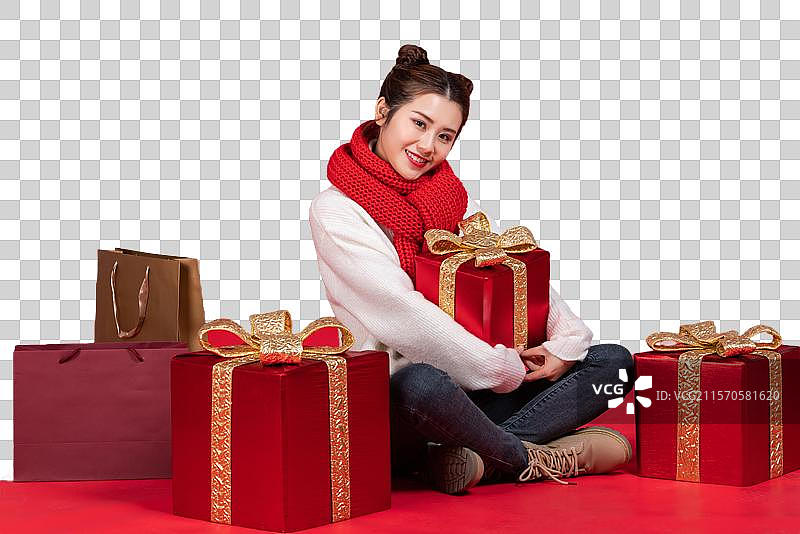 快乐的年轻女子和礼物图片素材