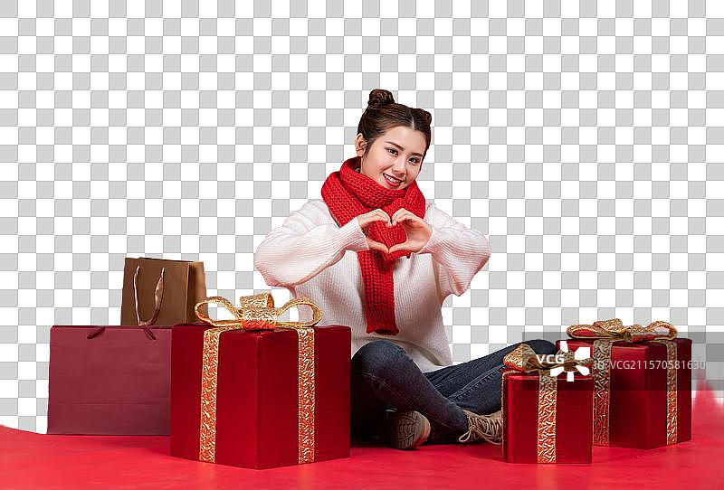 快乐的年轻女子和礼物图片素材