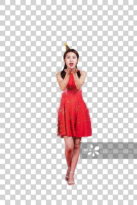 快乐的年轻女子手捧礼花图片素材