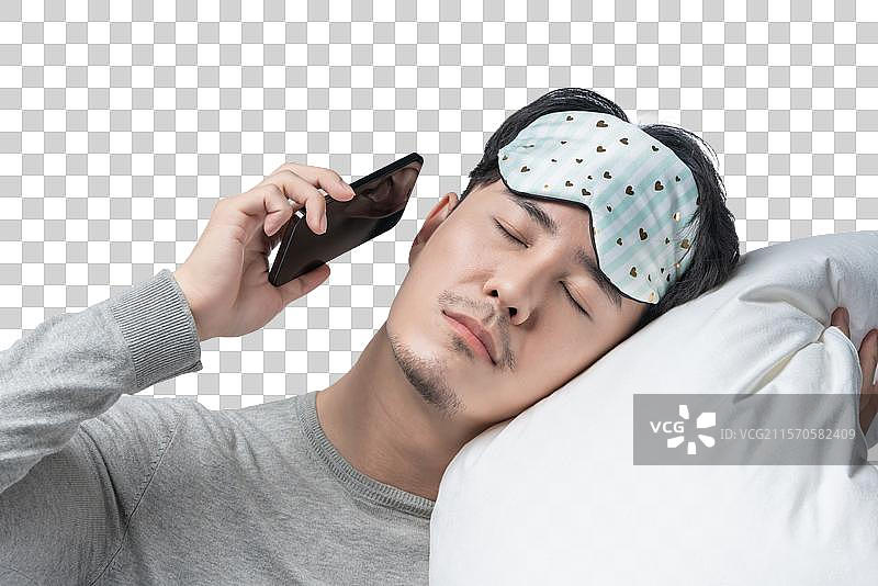 年轻男子拿着枕头图片素材