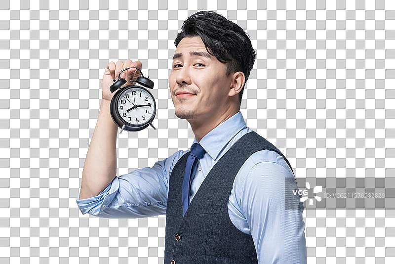 商务男士拿着闹钟图片素材