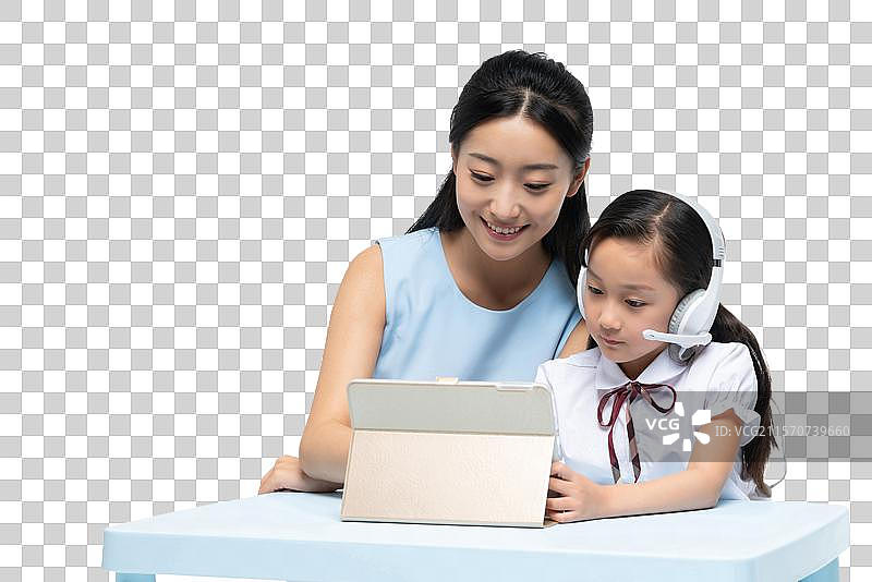 年轻女老师辅导学生学习图片素材