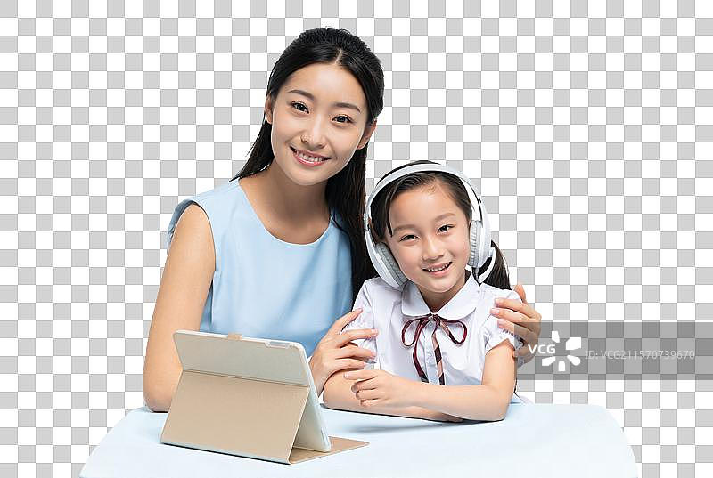 年轻女老师辅导学生学习图片素材