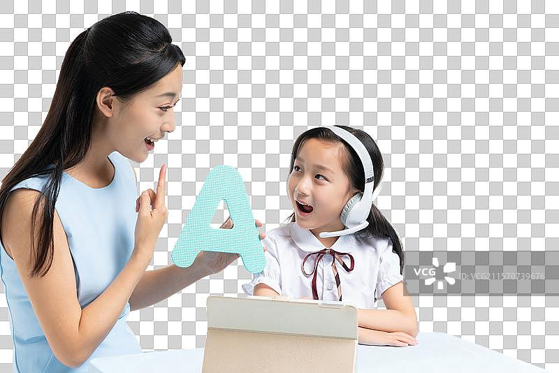 年轻女老师辅导学生学习图片素材