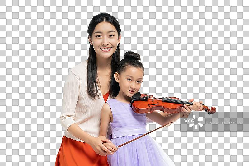 女老师指导女孩演奏乐器图片素材