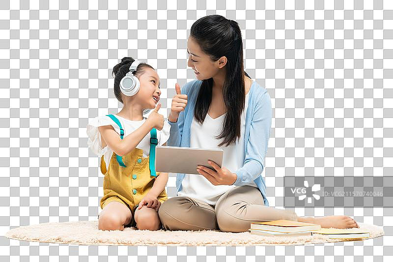 年轻女老师辅导学生学习图片素材