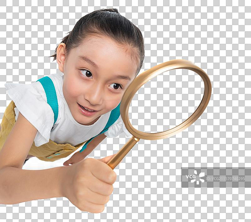 快乐的女孩拿着放大镜图片素材