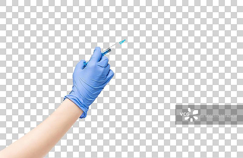 拿着注射器的手图片素材