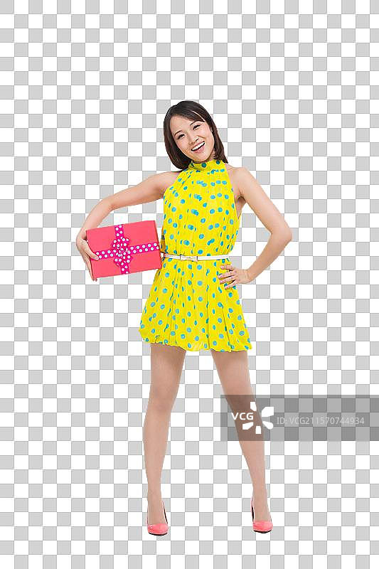 棚拍时尚活力年轻人捧着礼盒图片素材