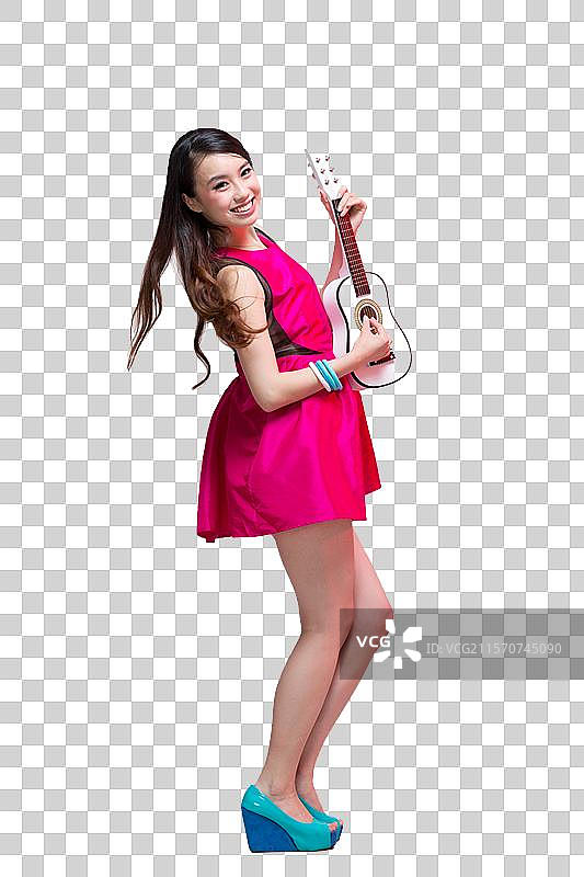 棚拍时尚活力年轻人弹吉他图片素材