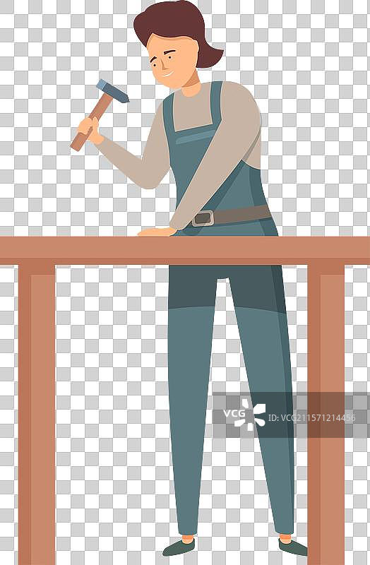 女木匠在木板上钉钉子图片素材