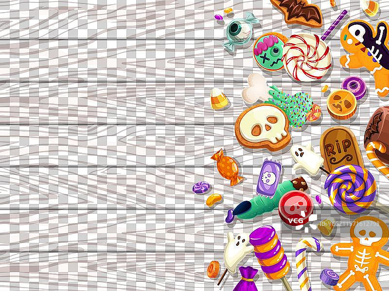 万圣节糖果放在木桌上，准备给小朋友们的“不给糖就捣蛋”活动。图片素材