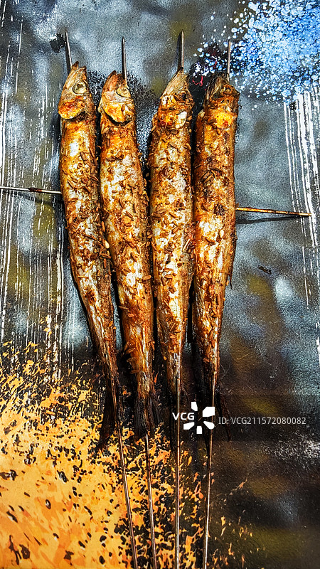 锦州凌河夜市烤多春鱼图片素材