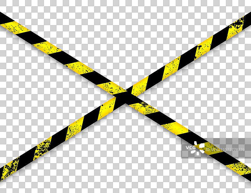 旧的磨损的路障施工黄色胶带图片素材