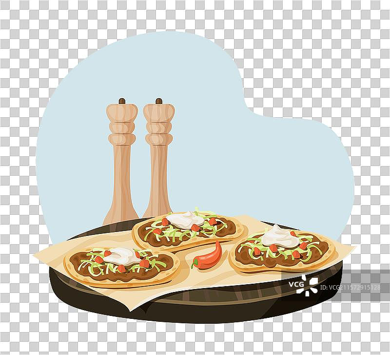 配有配料的玉米饼和胡椒磨碎器图片素材