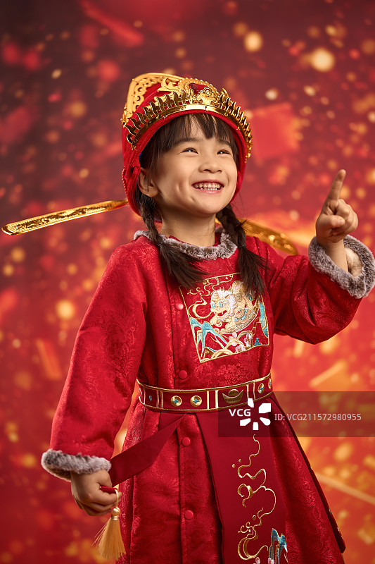 可爱的小女孩抛金币图片素材