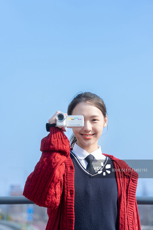 生活方式，阳光，出席，高中生，一人媒体，新词，自摄，视频拍摄，一个人图片素材