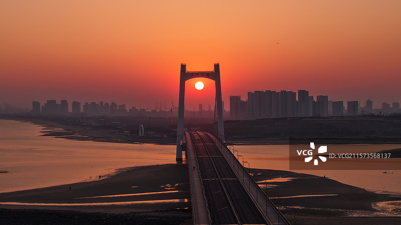 烟台市开发区夹河桥日出图片素材