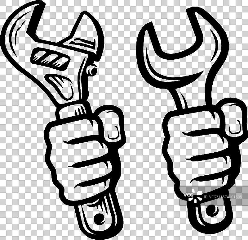 手握扳手工具进行修理图片素材