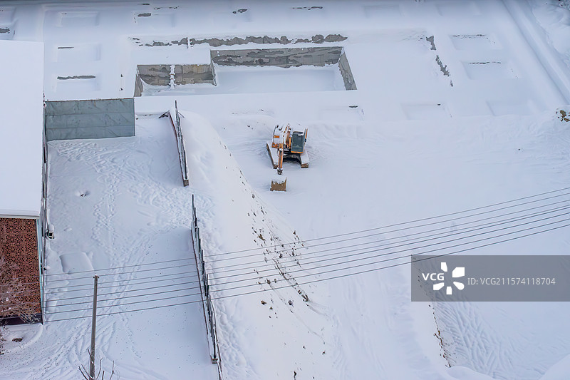 雪地里的挖掘机图片素材