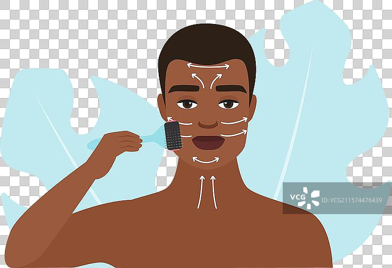 男子使用面部滚轮进行皮肤按摩图片素材