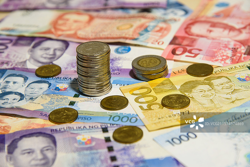 各种面额菲律宾比索 纸币和硬币图片素材