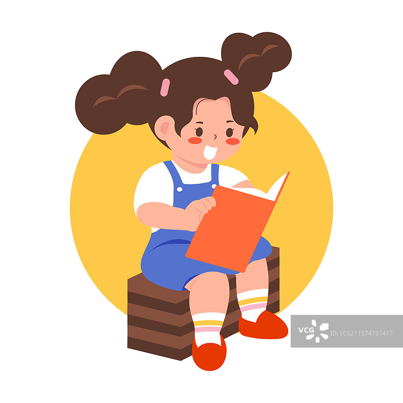 一个孩子坐着阅读一本书图片素材