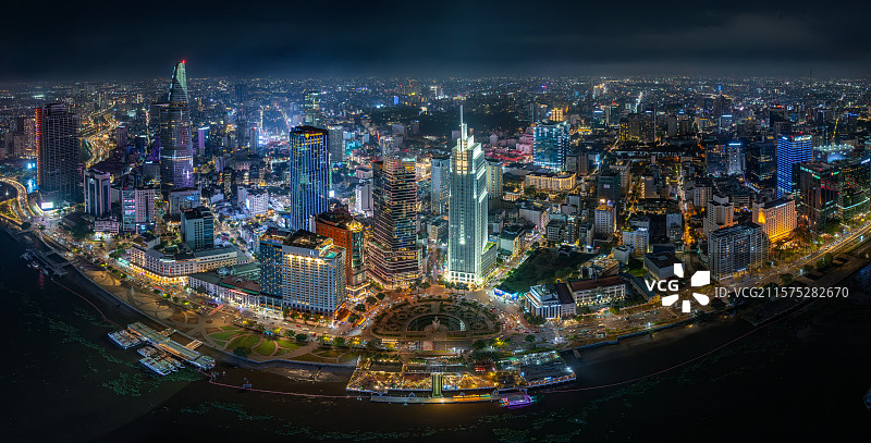 越南胡志明市西贡河城市高楼天际线夜景风光航拍图片素材