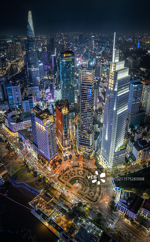 越南胡志明市西贡河城市高楼天际线夜景风光航拍图片素材