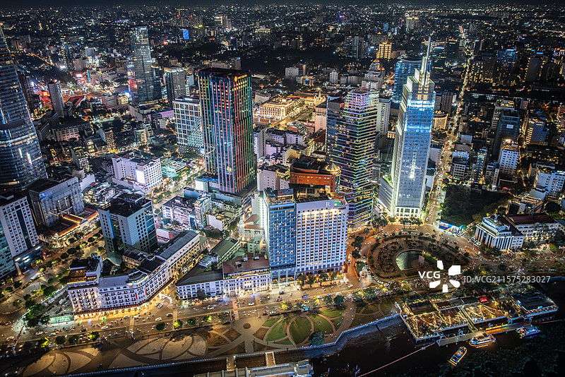越南胡志明市西贡河城市高楼天际线夜景风光航拍图片素材