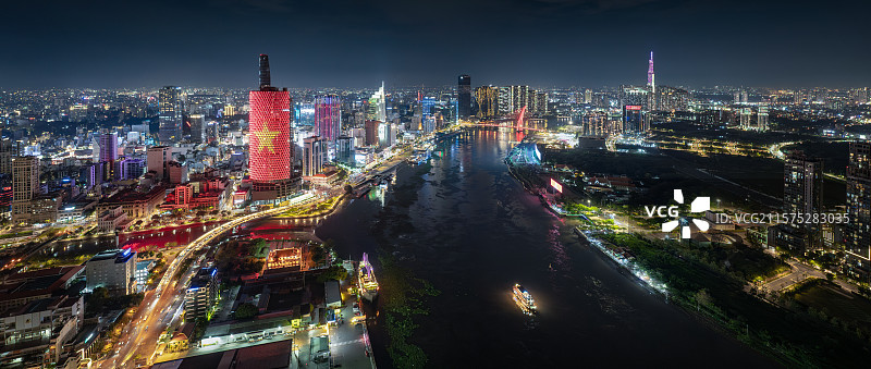 越南胡志明市西贡河城市高楼天际线夜景风光航拍图片素材