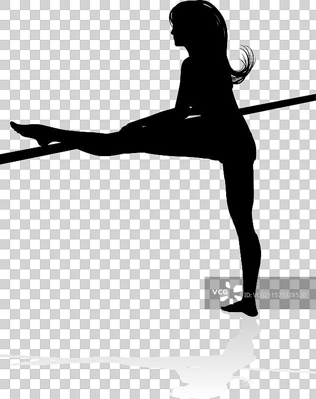 女性舞者拉伸的剪影图片素材