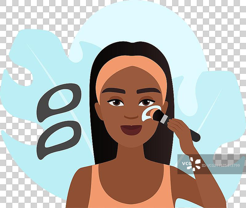 女人用腮红刷涂抹腮红图片素材