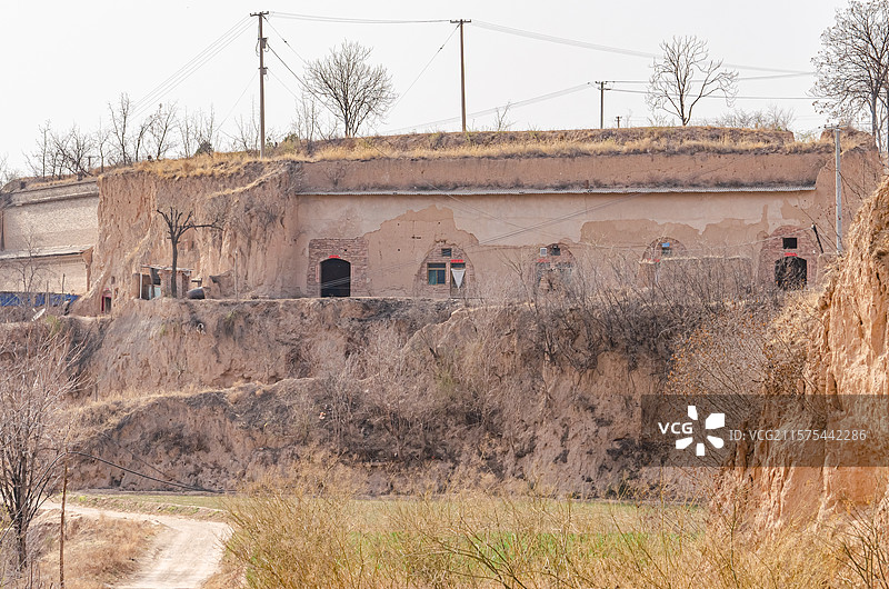 中国陕西山西宁夏甘肃黄土西北高坡房屋建筑，乡村风格古老的土窑窑洞，户外白昼无人图像摄影图片素材