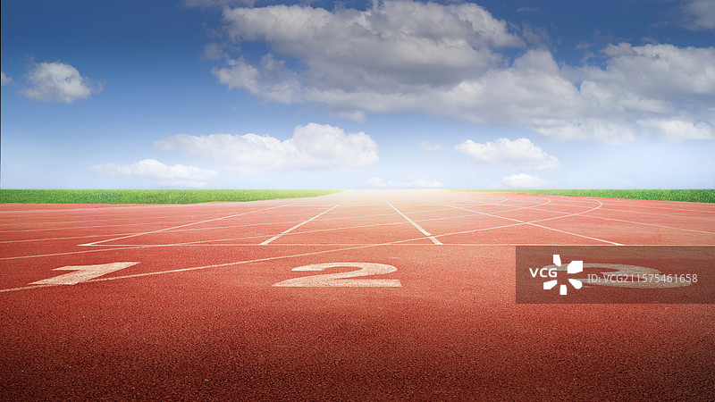 体育场上的红色田径跑道图片素材