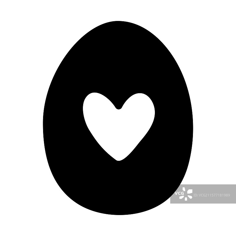 黑色蛋形物体带有心形切口，象征着爱。图片素材